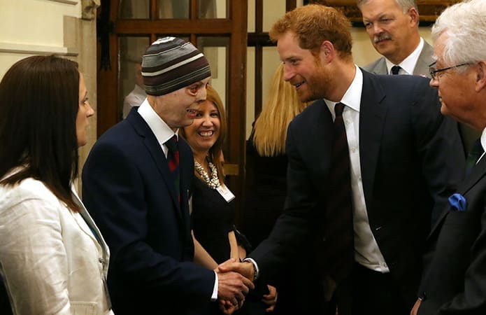 HRH Prince Harry speaking with Charity beneficiary Martyn Compton