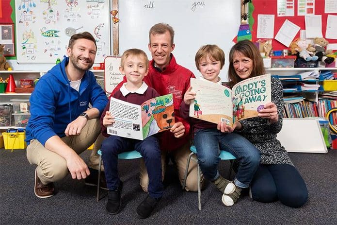 Charles Dunphie, Regional Director for the Army Benevolent Fund in Scotland, with some of the children who are benefitting from RCET's work