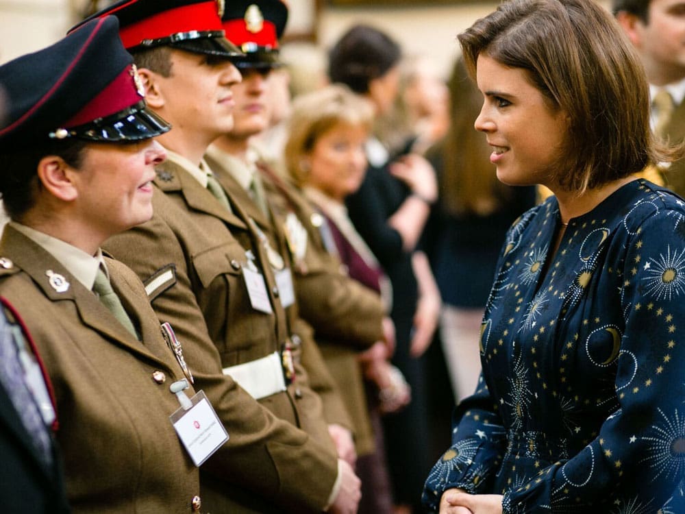 Princess Eugenie speaking to a soldier